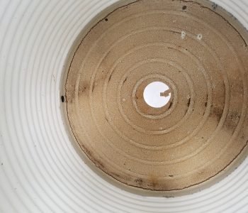 dirty brown colour at bottom of Polytank